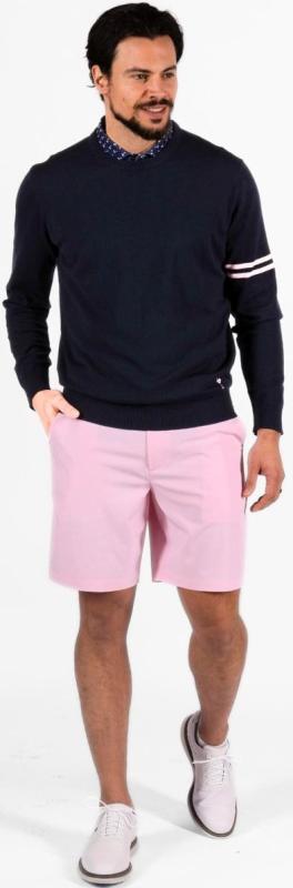 The new menswear lines from Golftini incorporate a pink element, such as the shorts and the armband trim on the top.